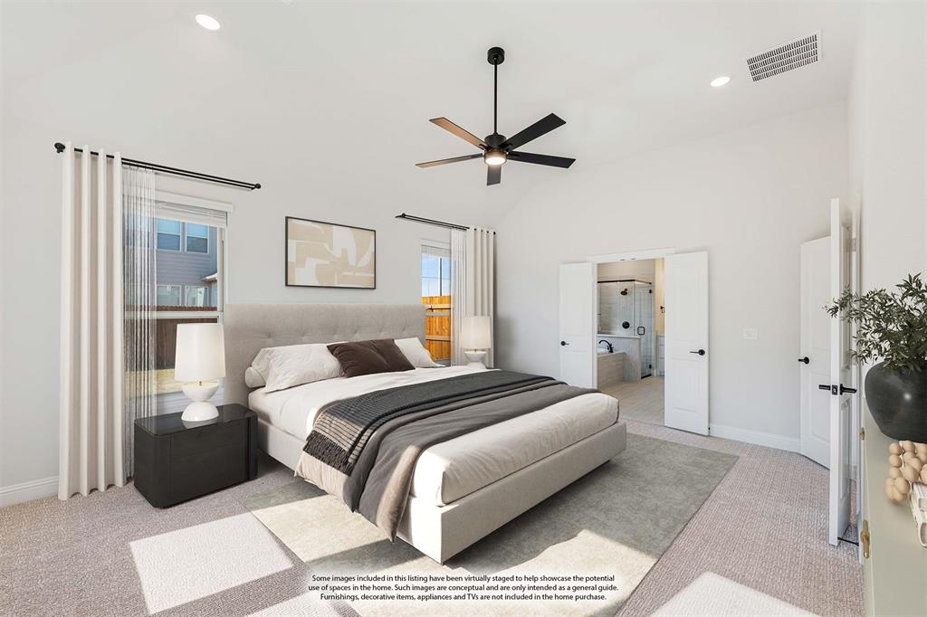 2505 Rileigh Lane Mansfield, TX 76063 - Photo 21 of 40 a bedroom with a bed and a chandelier