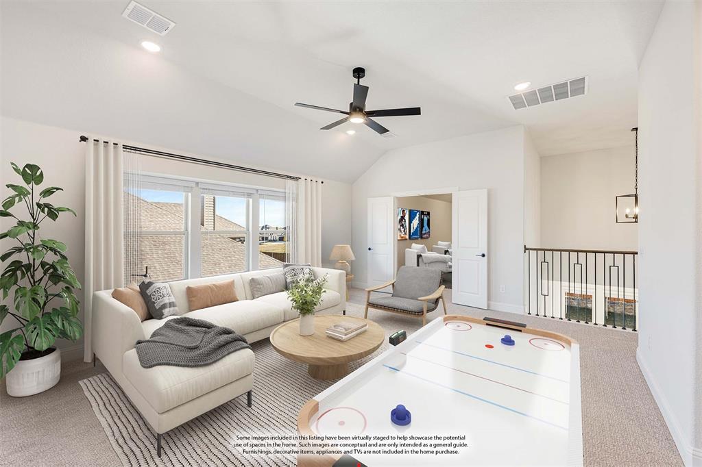 2505 Rileigh Lane Mansfield, TX 76063 - Photo 26 of 40 a living room with furniture and a potted plant
