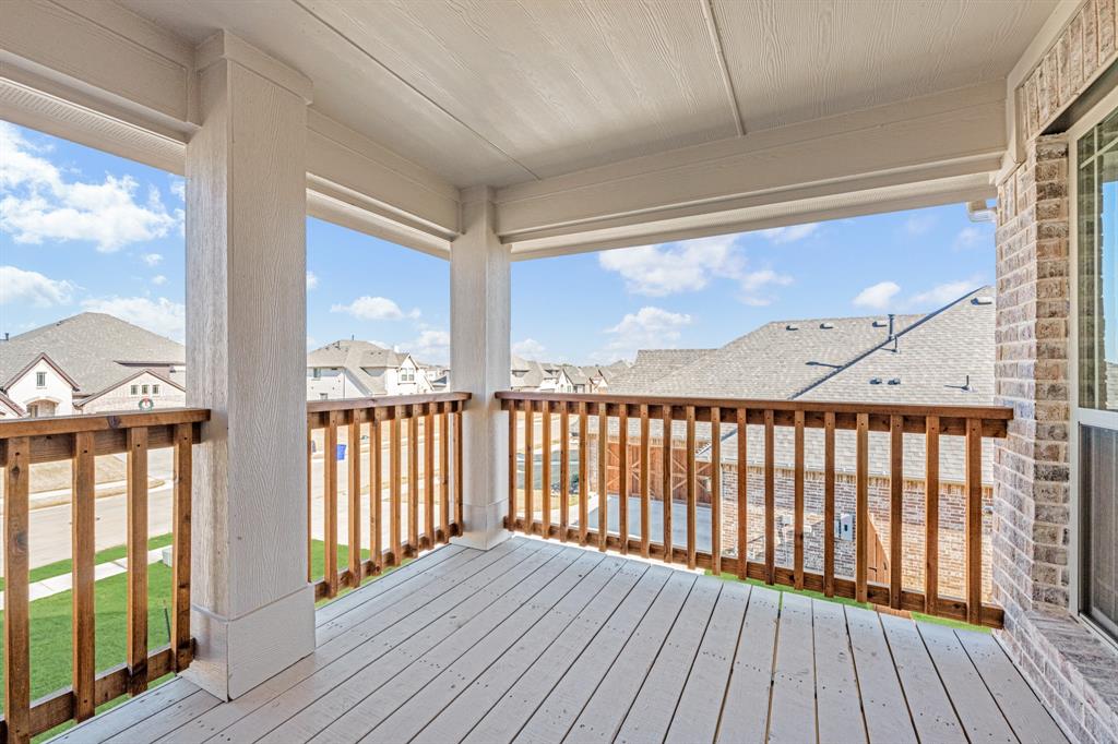 2505 Rileigh Lane Mansfield, TX 76063 - Photo 28 of 40 a view of a balcony with wooden floor