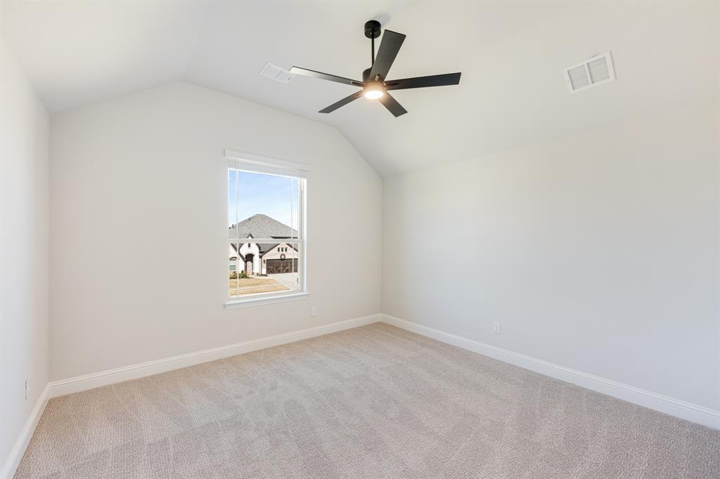 2505 Rileigh Lane Mansfield, TX 76063 - Photo 32 of 40 an empty room with a window and a fan