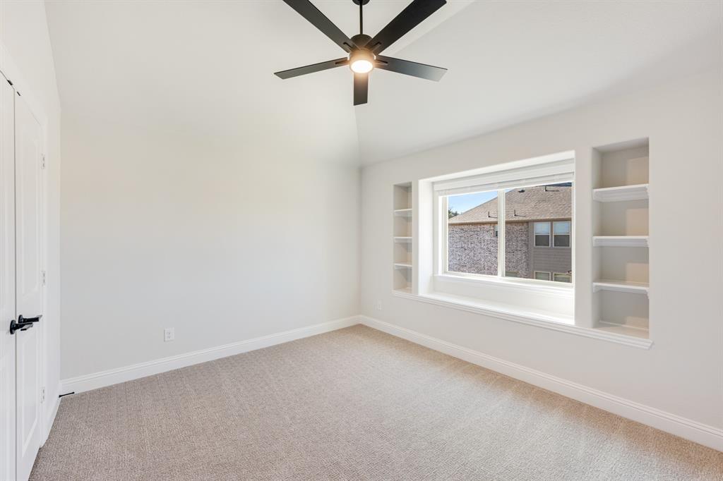 2505 Rileigh Lane Mansfield, TX 76063 - Photo 35 of 40 an empty room with a window and a fan