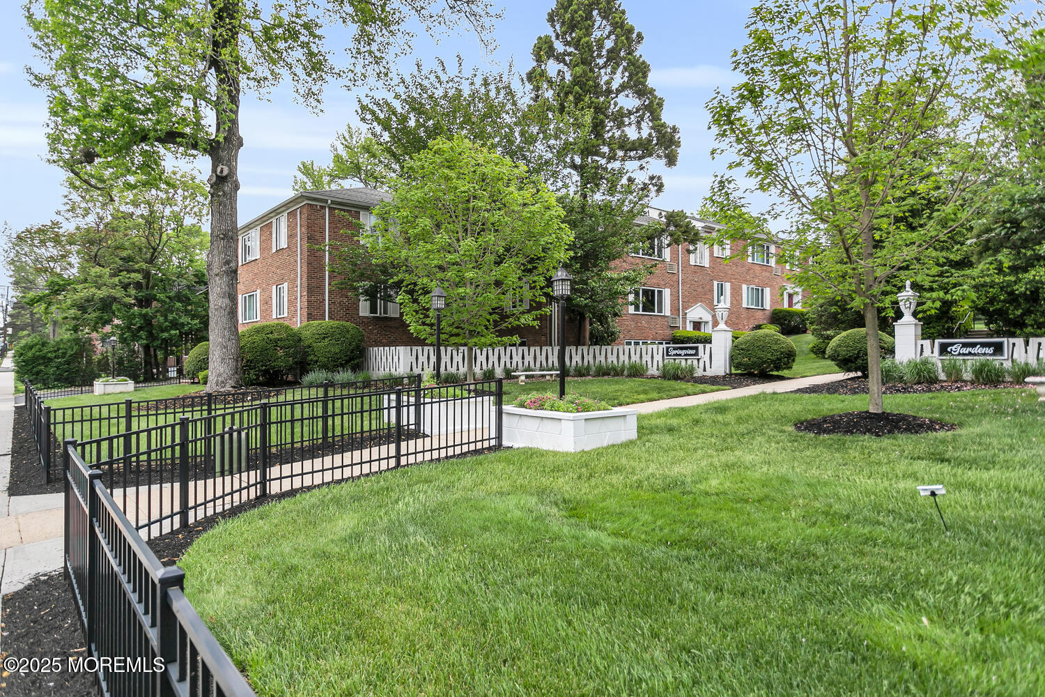 283 Spring Street, Unit 3C Red Bank, NJ 07701 - Photo 1 of 26 a view of a garden