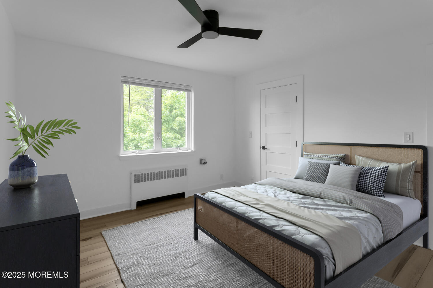 283 Spring Street, Unit 3C Red Bank, NJ 07701 - Photo 15 of 26 a bedroom with bed and a window