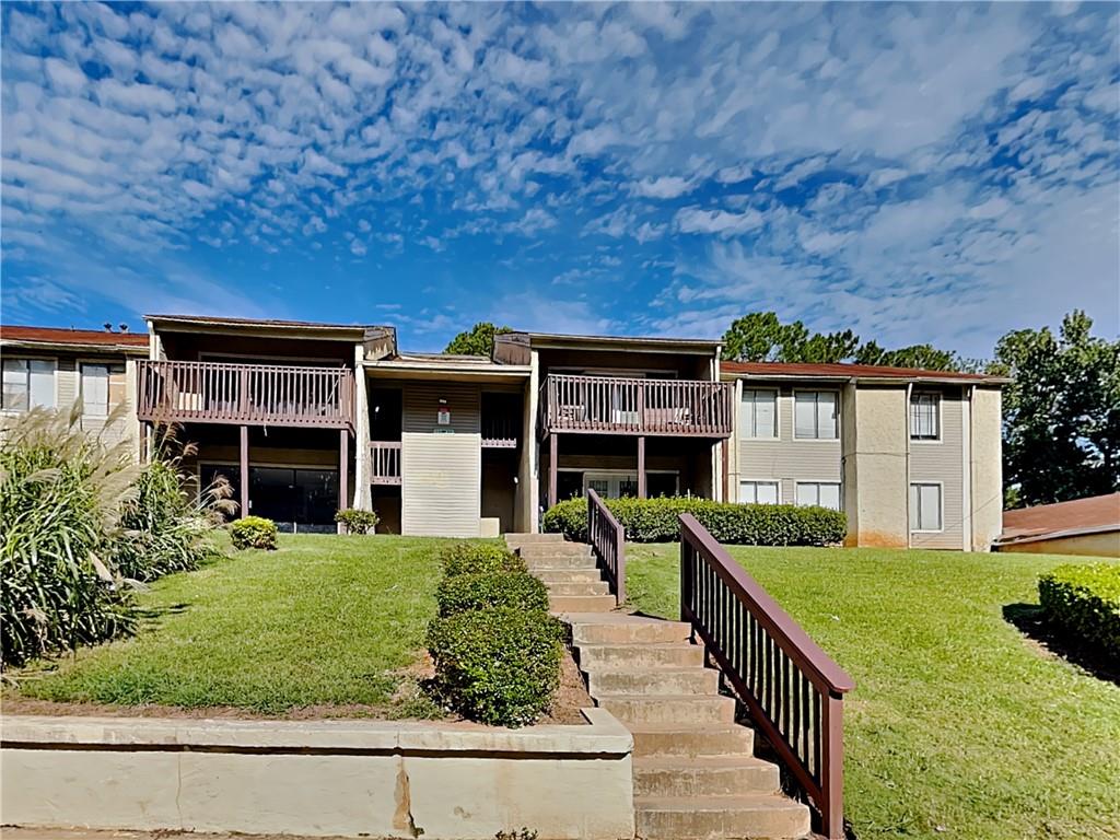 3575 Oakvale Road, Unit 405 Decatur, GA 30034 - Photo 1 of 1 front view of house with a yard