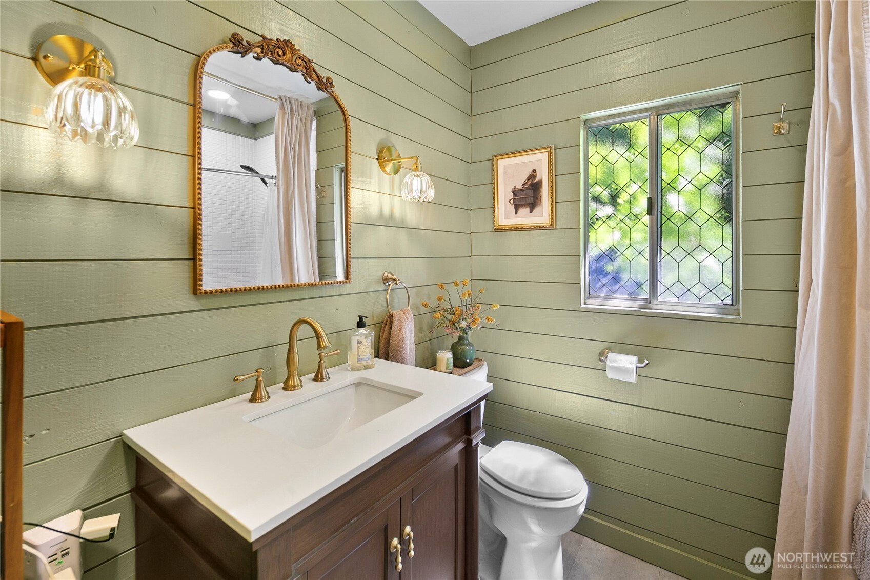 16832 McIntyre Road Southwest Vashon, WA 98070 - Photo 16 of 38 a bathroom with a toilet sink and mirror