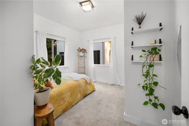 a bathroom with a sink and a window