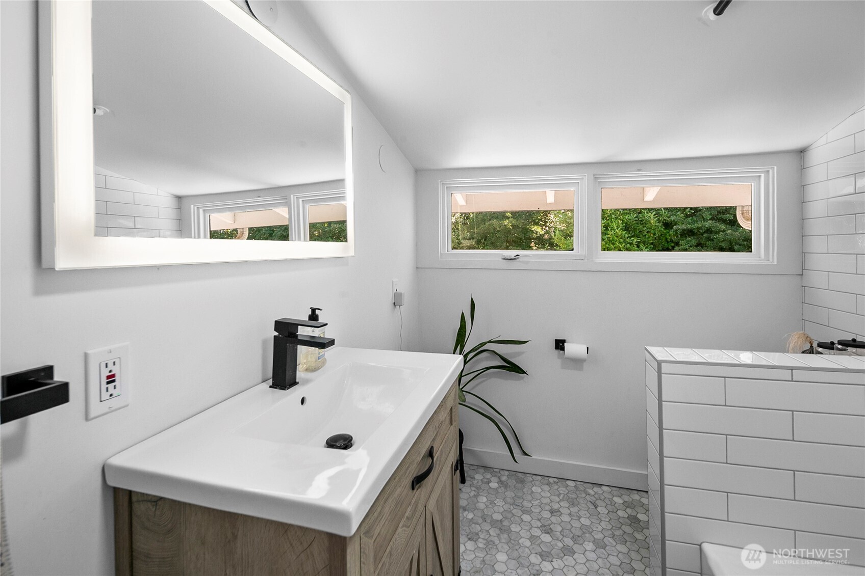 16832 McIntyre Road Southwest Vashon, WA 98070 - Photo 21 of 38 a bathroom with a sink and a window