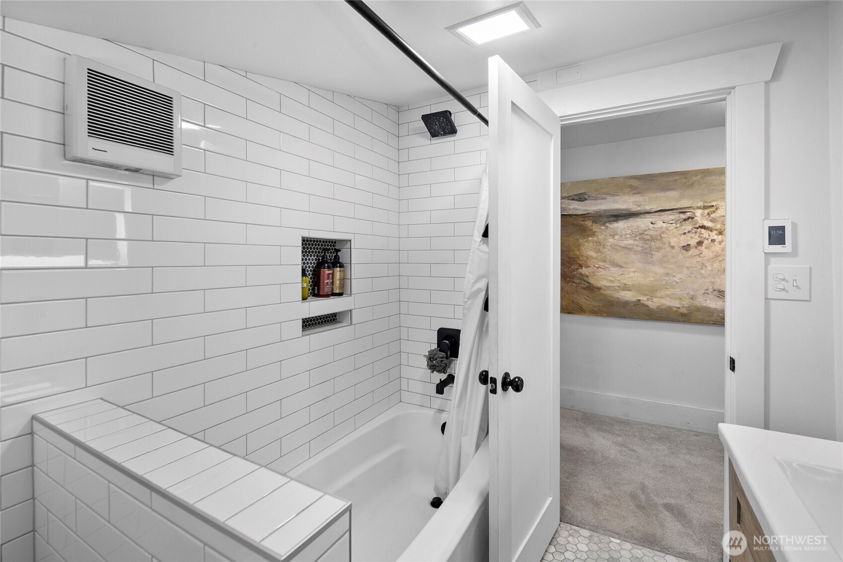 16832 McIntyre Road Southwest Vashon, WA 98070 - Photo 22 of 38 a bathroom with a bathtub and shower