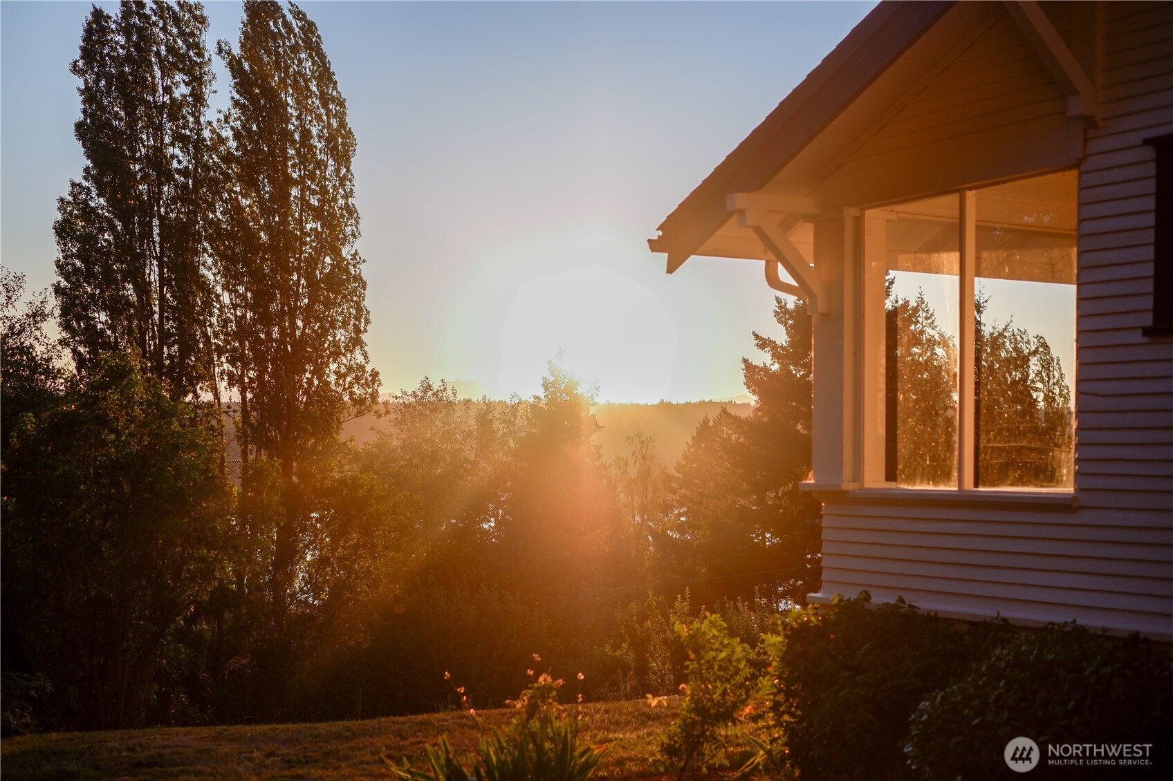 16832 McIntyre Road Southwest Vashon, WA 98070 - Photo 30 of 38 a view of a house with a tree