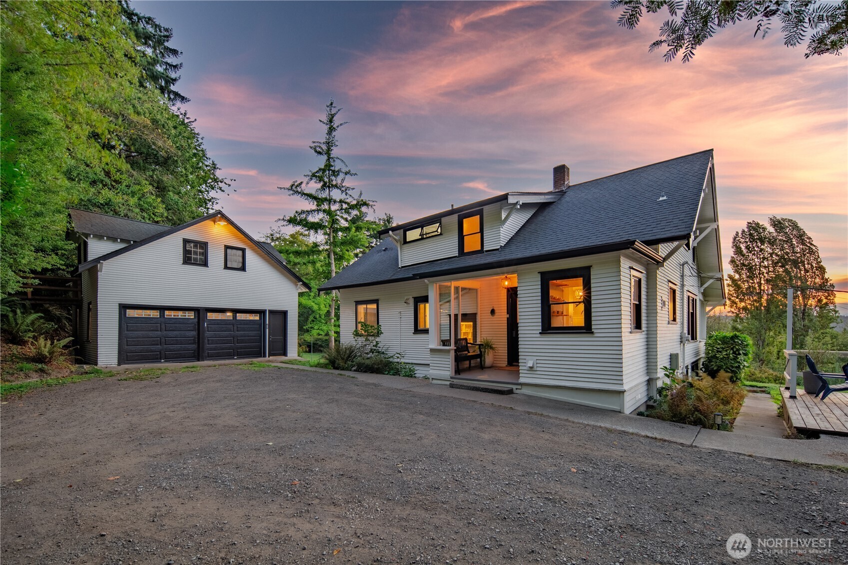16832 McIntyre Road Southwest Vashon, WA 98070 - Photo 3 of 38 a front view of a house with a yard