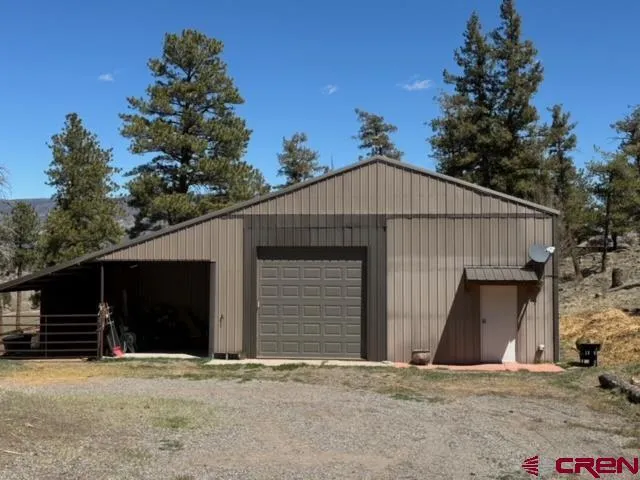 a front view of a house with a garage