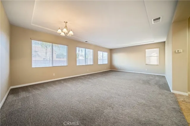 a spacious bathroom with a sink a mirror and a bathtub