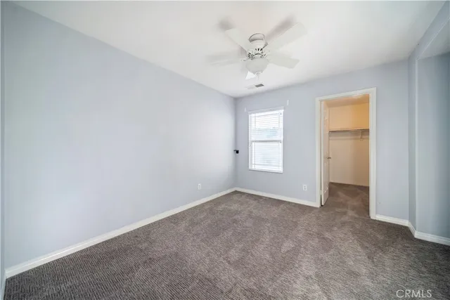 a bathroom with a double vanity sink and mirror