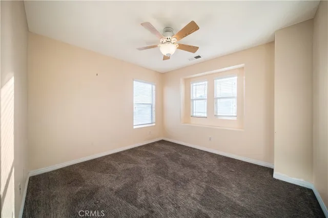 a bathroom with a toilet and a bathtub