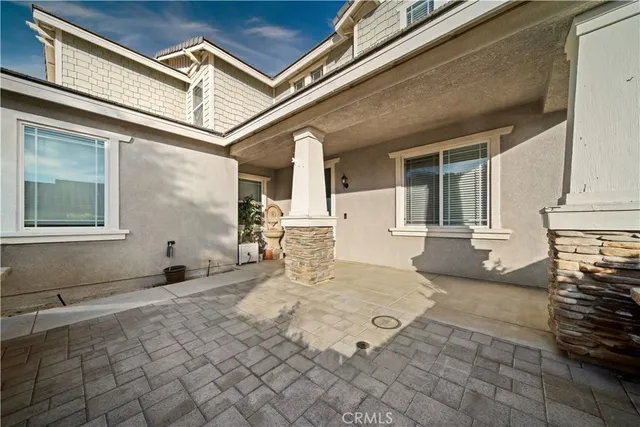 a view of house with backyard