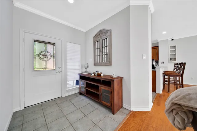 a living room with lots of furniture and a flat screen tv