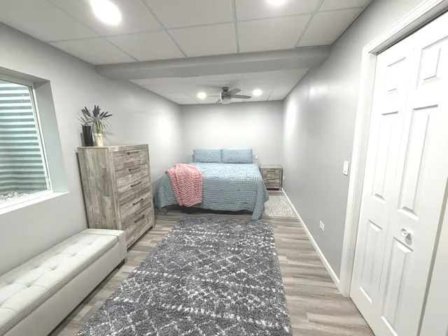 a living room with furniture and a rug