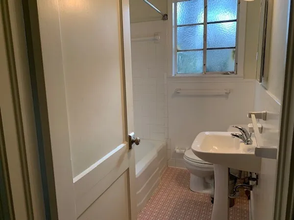 a bathroom with a sink and mirror