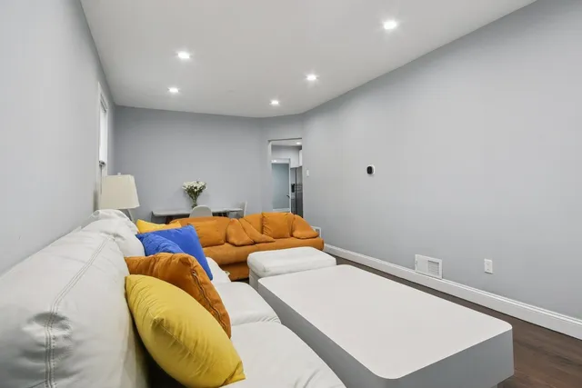 a bedroom with bed and a window