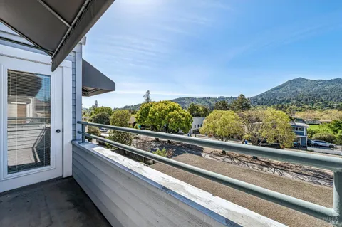 a view of a balcony with an outdoor space
