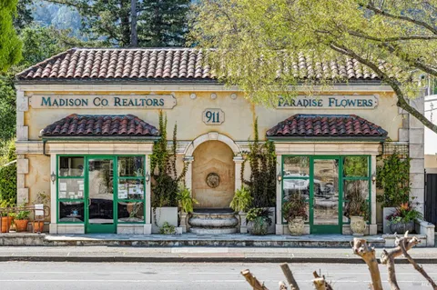 a view of a car park in front of building