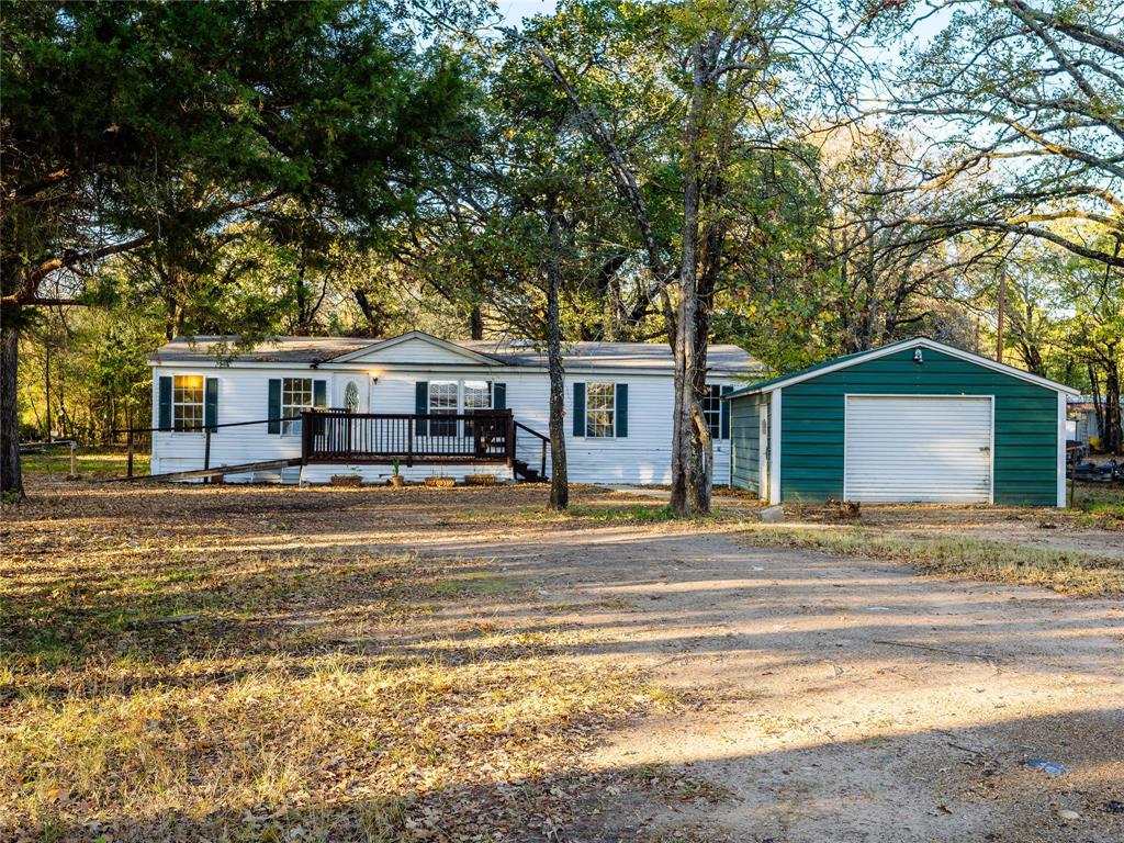 202 Forgotten Lane Mabank, TX 75156 - Photo 21 of 36 a front view of a house with a ocean view