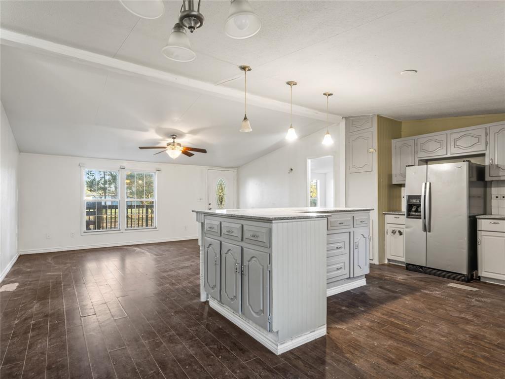 202 Forgotten Lane Mabank, TX 75156 - Photo 36 of 36 a view of kitchen with stainless steel appliances cabinets and wooden floor
