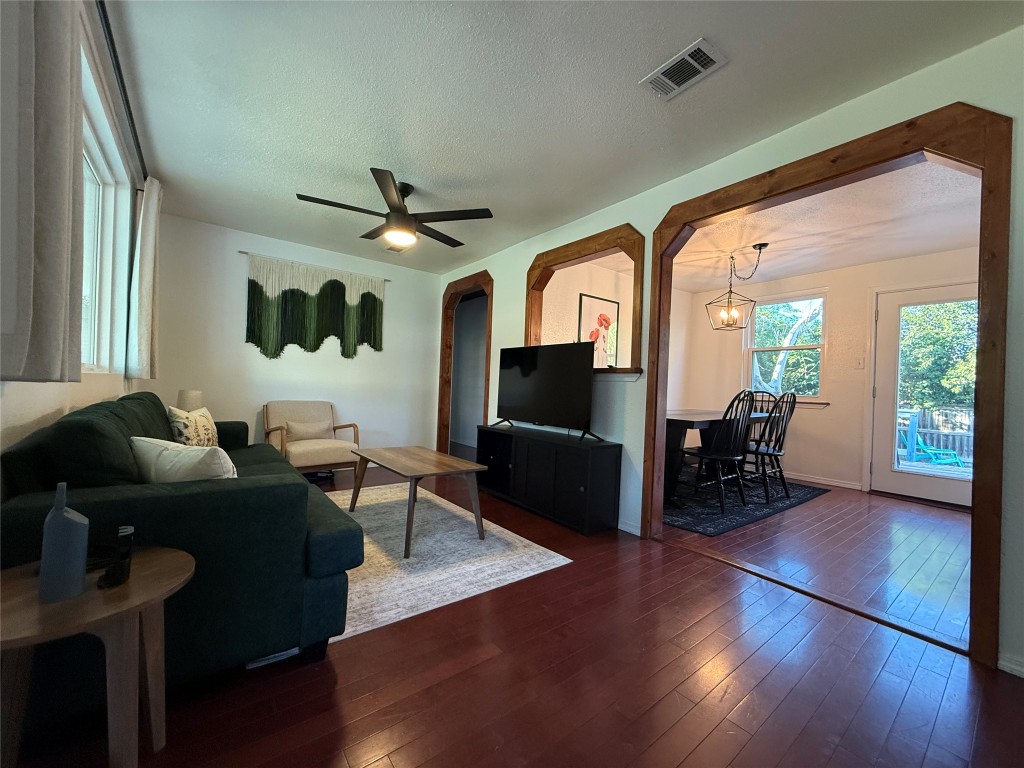 505 East 4th Street Georgetown, TX 78626 - Photo 4 of 18 a living room with furniture and a flat screen tv