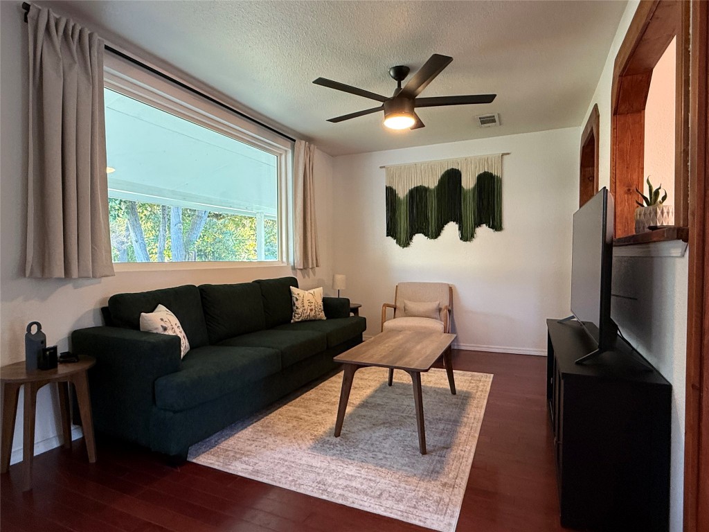 505 East 4th Street Georgetown, TX 78626 - Photo 5 of 18 a living room with furniture and a large window