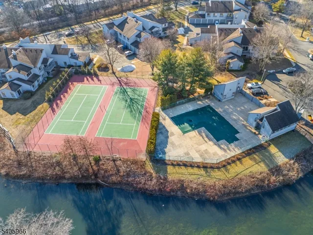 a view of a houses with trees
