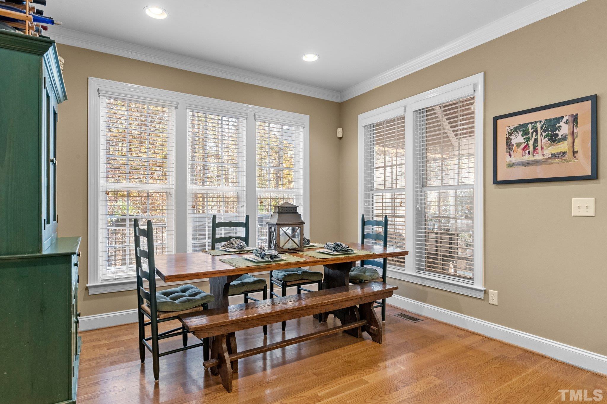 52 Evening Lane Clayton, NC 27527 - Photo 15 of 58 a dining room with furniture and window