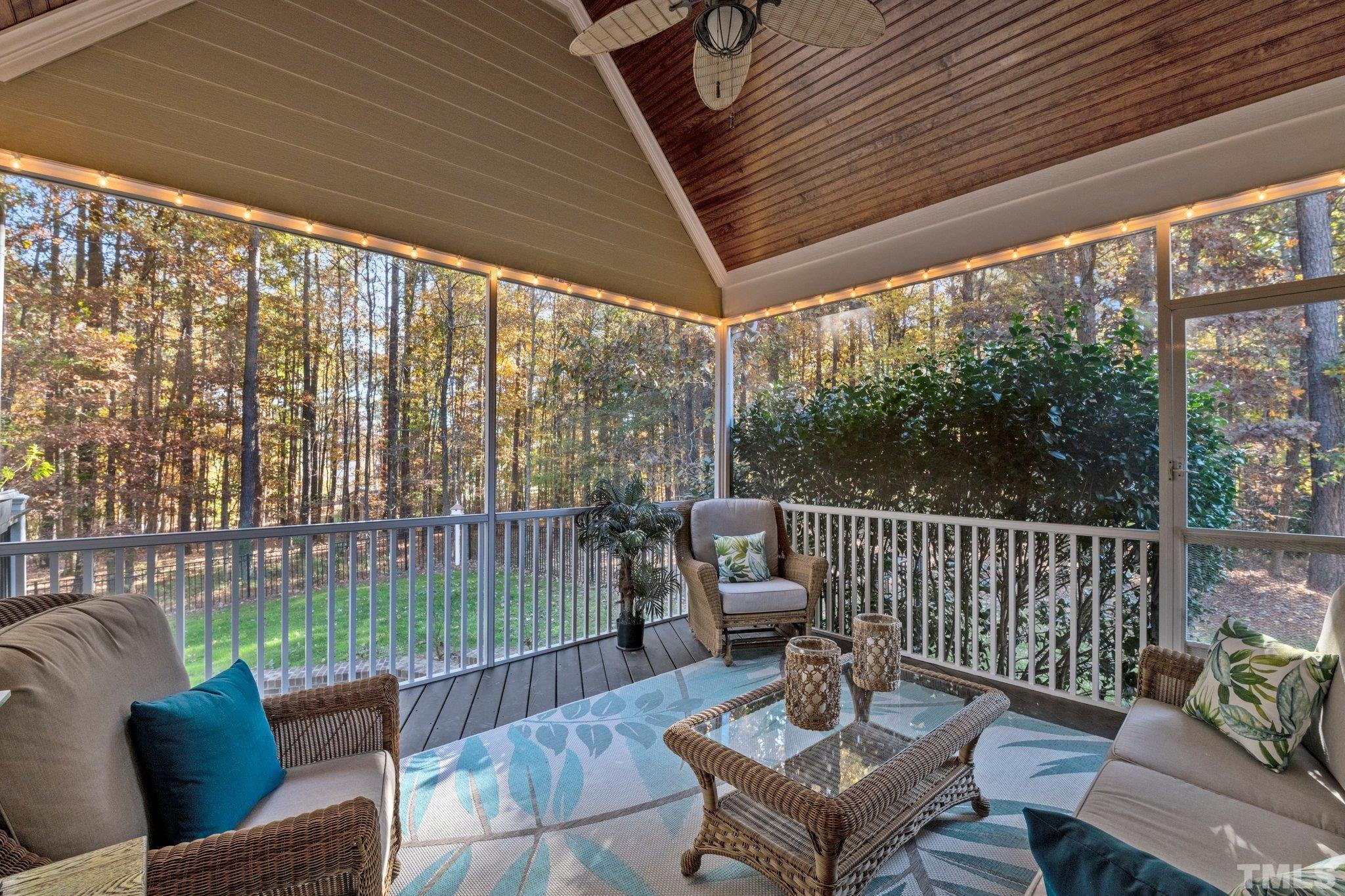 52 Evening Lane Clayton, NC 27527 - Photo 17 of 58 a outdoor living space with furniture and a garden