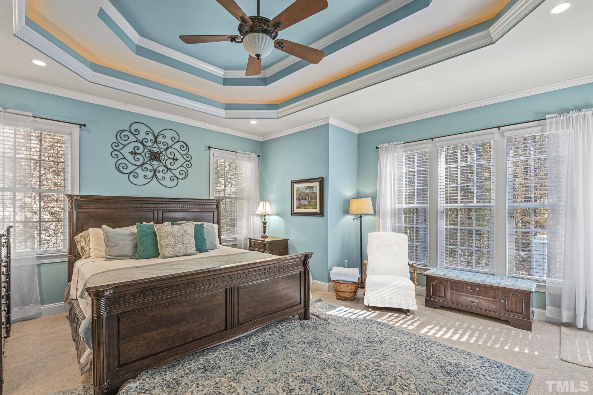 52 Evening Lane Clayton, NC 27527 - Photo 18 of 58 a bedroom with furniture and a large window