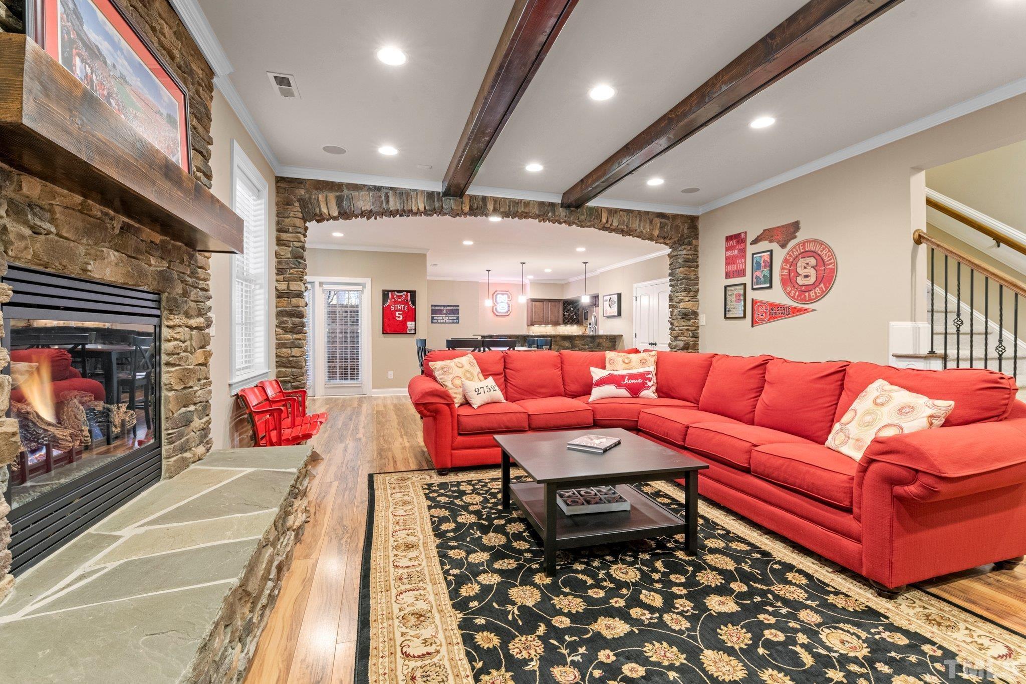 52 Evening Lane Clayton, NC 27527 - Photo 26 of 58 a living room with furniture and a fireplace