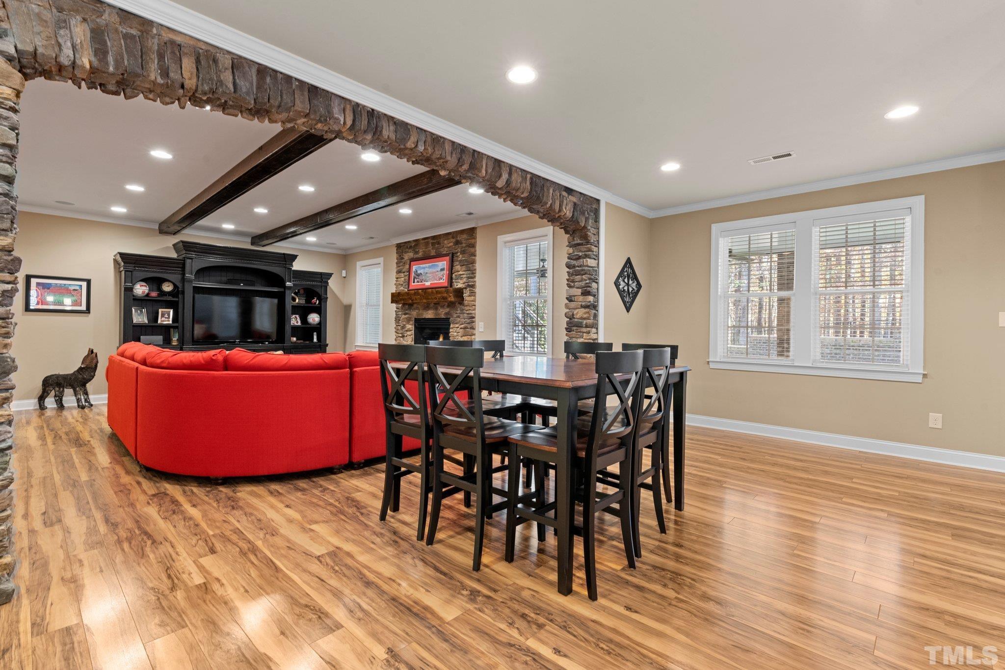 52 Evening Lane Clayton, NC 27527 - Photo 28 of 58 a view of a dining room with furniture window and wooden floor