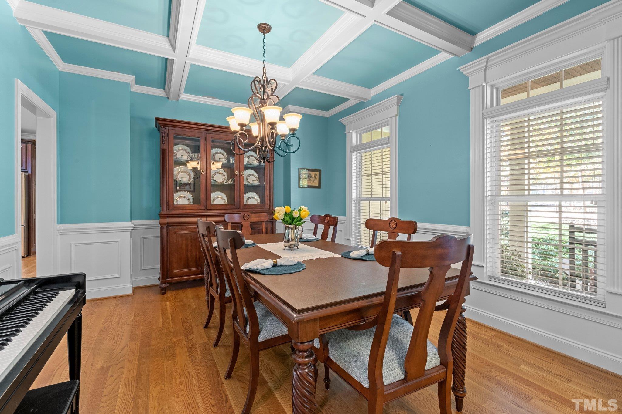 52 Evening Lane Clayton, NC 27527 - Photo 5 of 58 a view of a dining room with furniture window and wooden floor