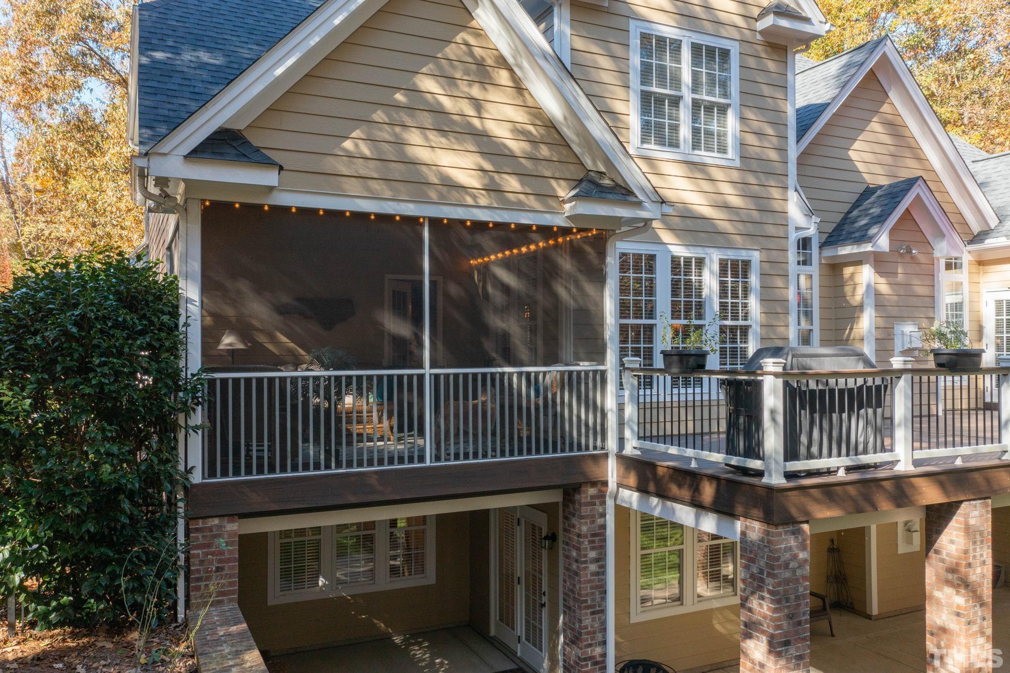 52 Evening Lane Clayton, NC 27527 - Photo 51 of 58 a view of small wooden deck with large tree