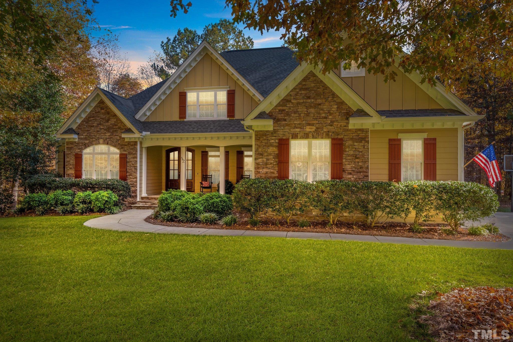 52 Evening Lane Clayton, NC 27527 - Photo 58 of 58 a front view of a house with a yard