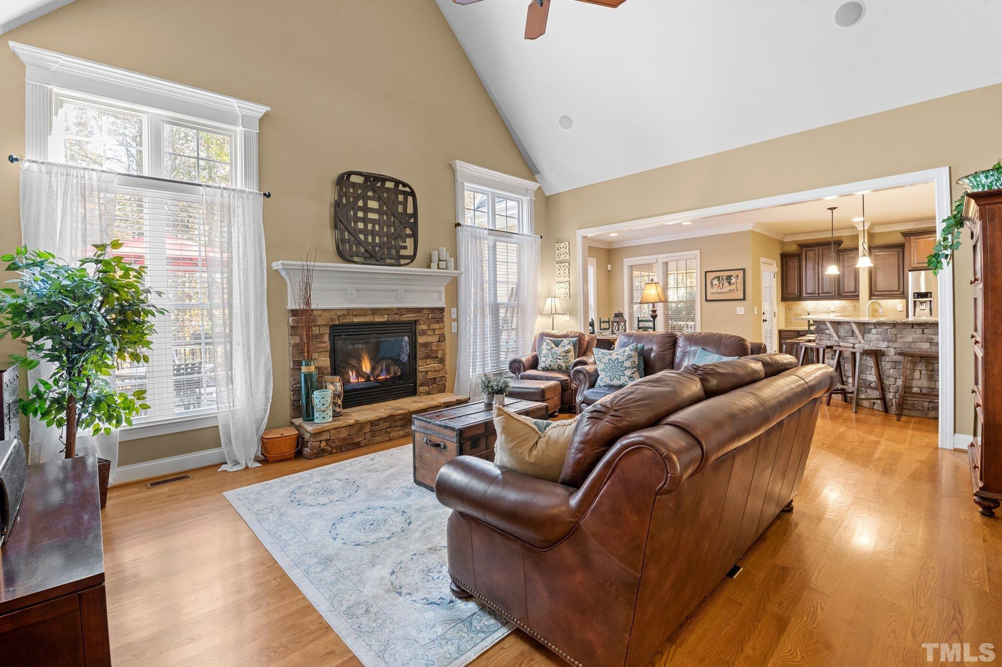 52 Evening Lane Clayton, NC 27527 - Photo 10 of 58 a living room with furniture and a fireplace