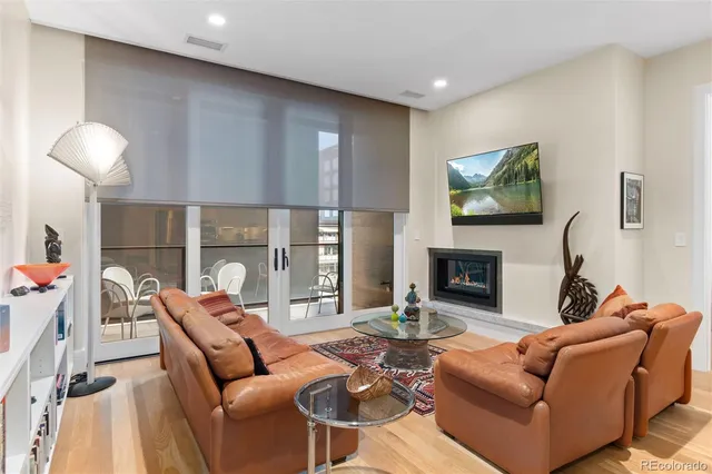 a couple of chairs sitting next to a bathroom