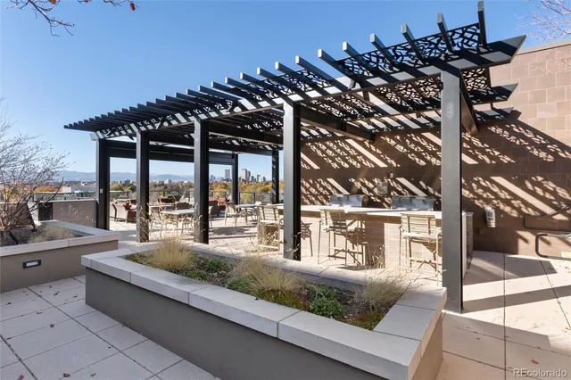 a view of a terrace with seating area