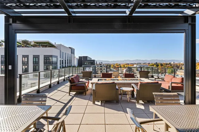 a view of swimming pool with chairs