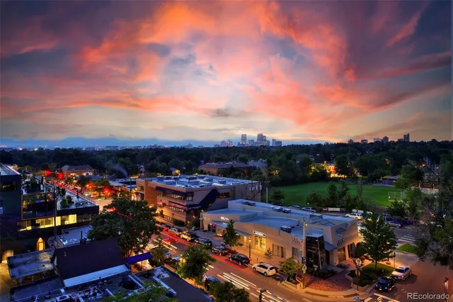 a view of a swimming pool with an outdoor seating