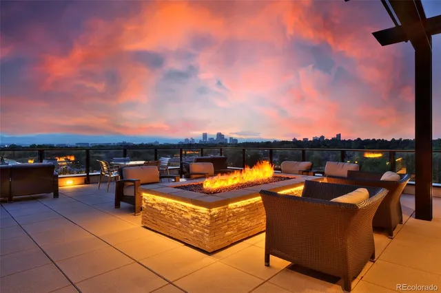 a building outdoor space with couple of furniture