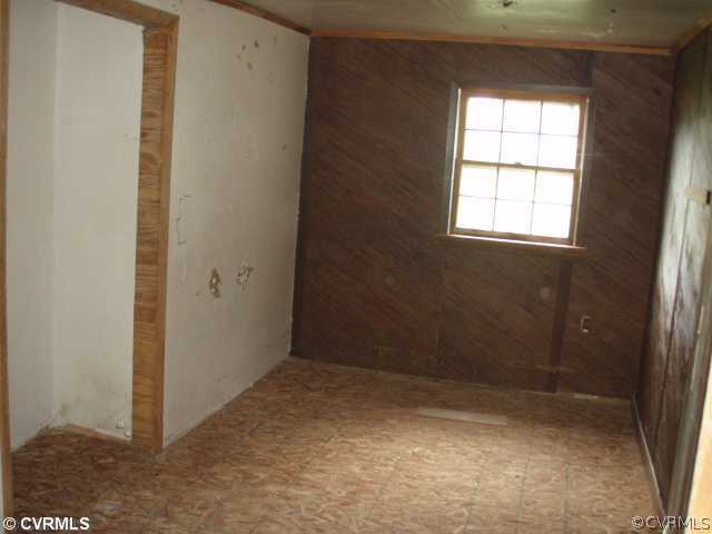 1775 Courthouse Road Louisa, VA 23093 - Photo 7 of 10 an empty room with windows