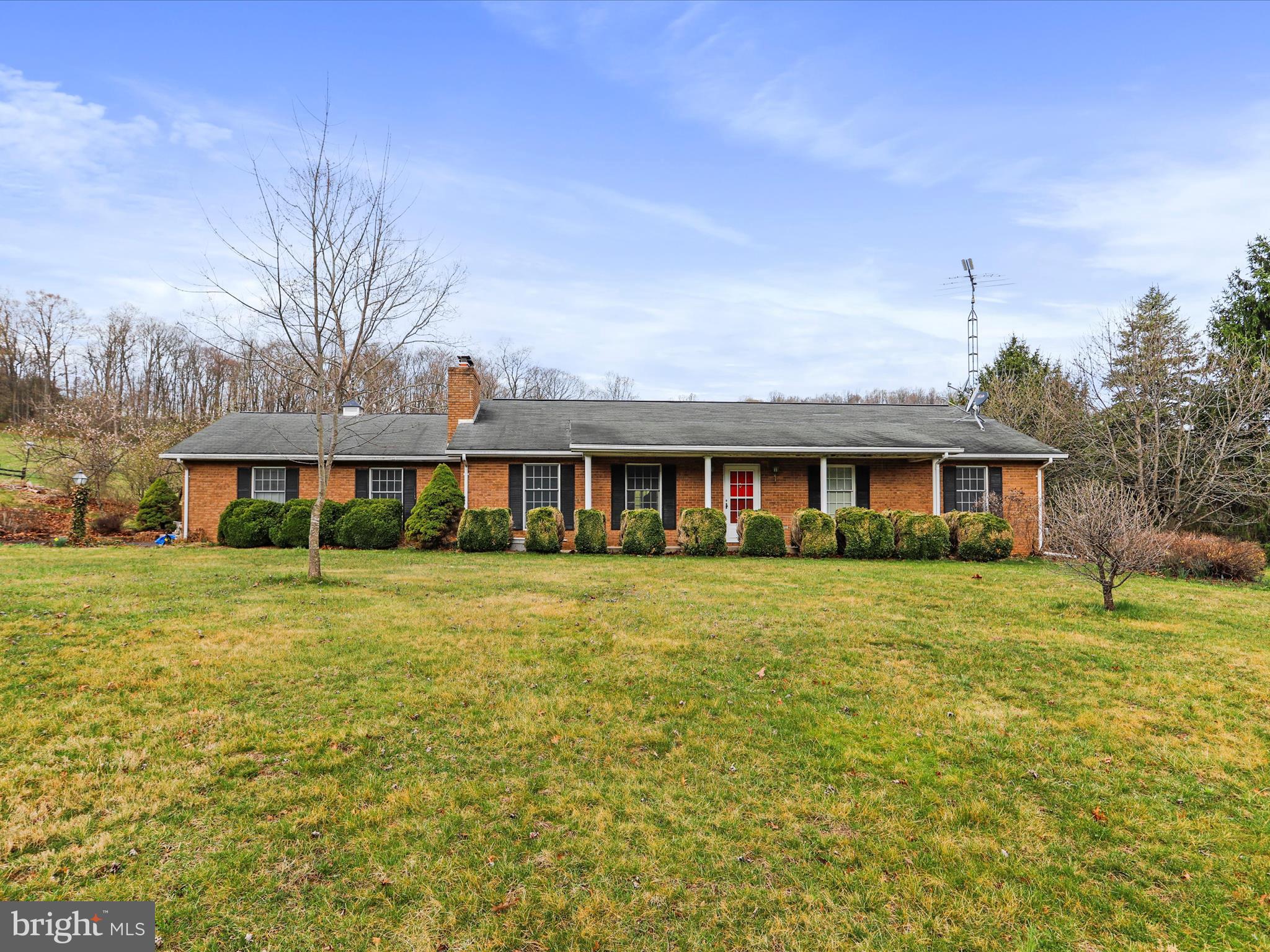 12440 Indian Springs Road Clear Spring, MD 21722 - Photo 7 of 35 a front view of a house with a yard