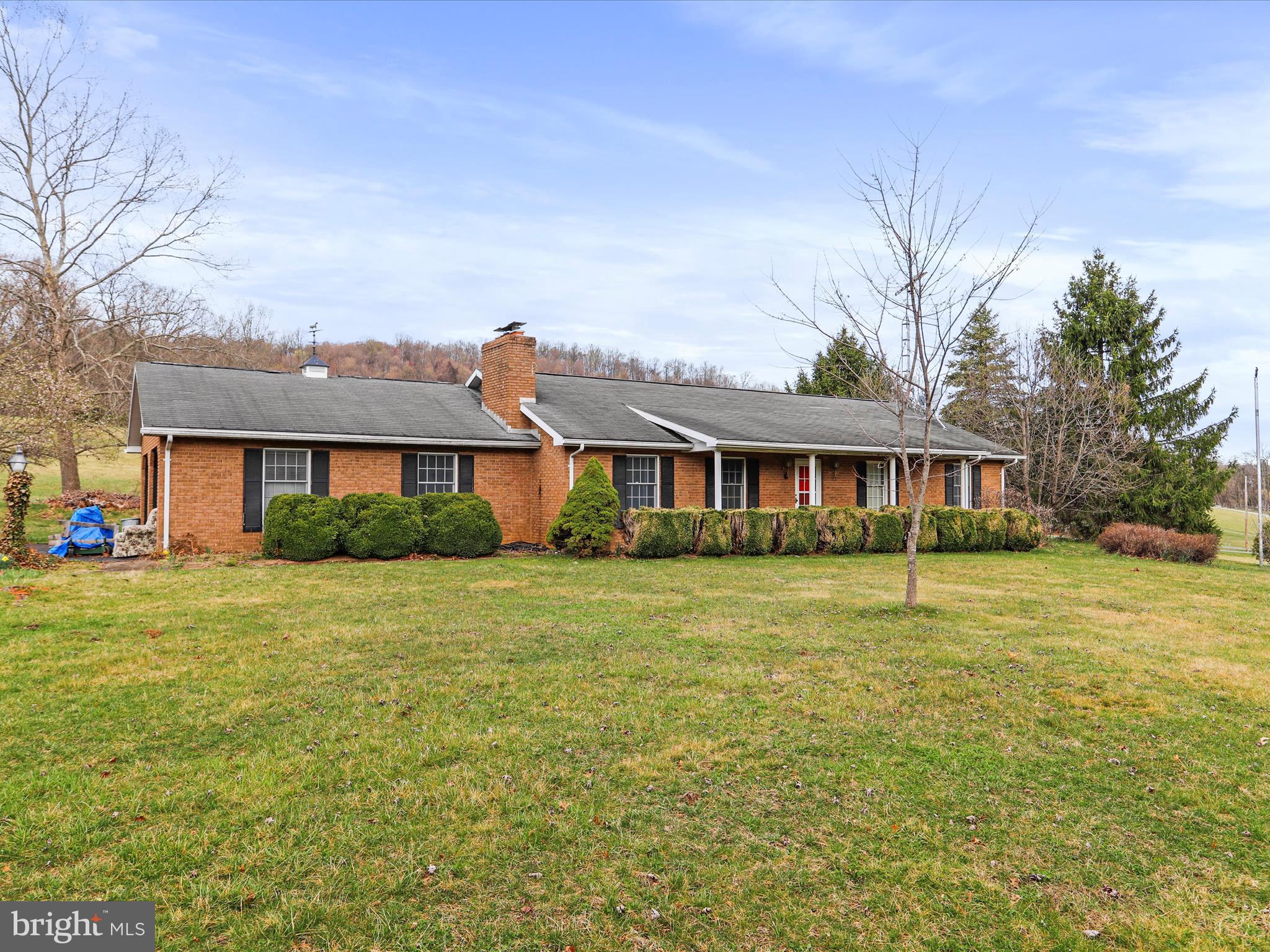 12440 Indian Springs Road Clear Spring, MD 21722 - Photo 8 of 35 a front view of a house with a garden