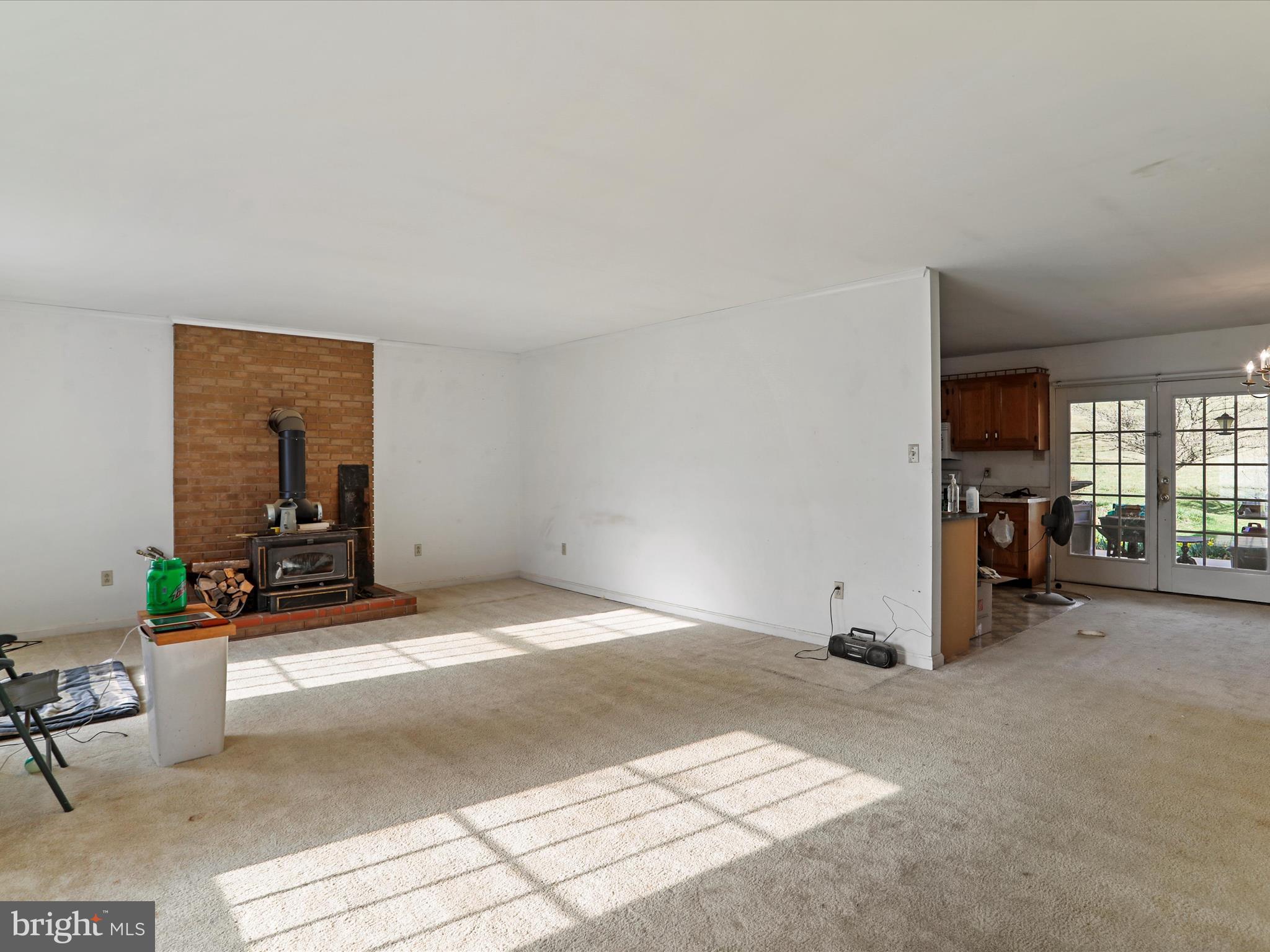 12440 Indian Springs Road Clear Spring, MD 21722 - Photo 10 of 35 a view of a livingroom with furniture and an empty room