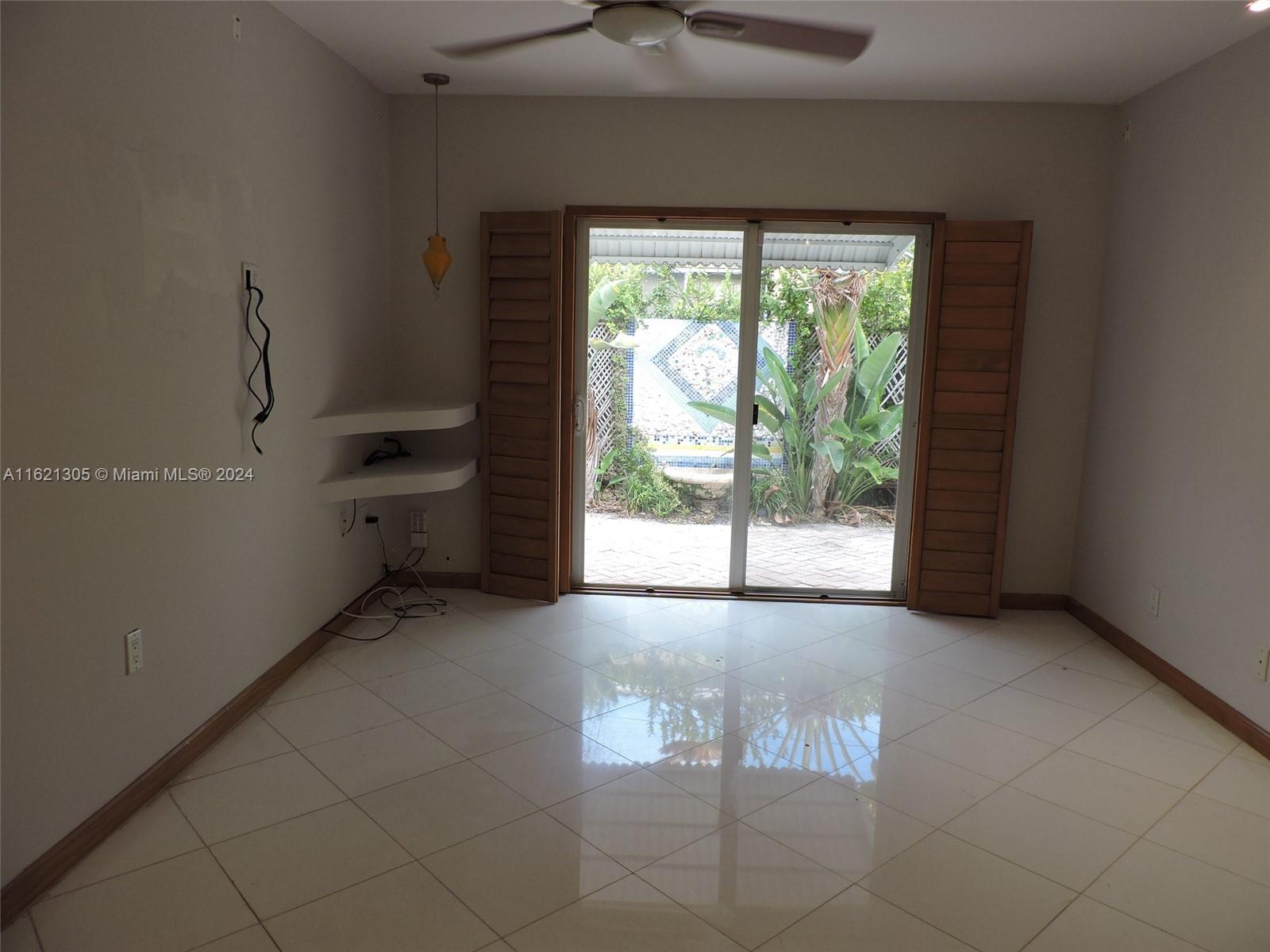1630 Tyler Street Hollywood, FL 33020 - Photo 26 of 26 a view of an empty room with a window