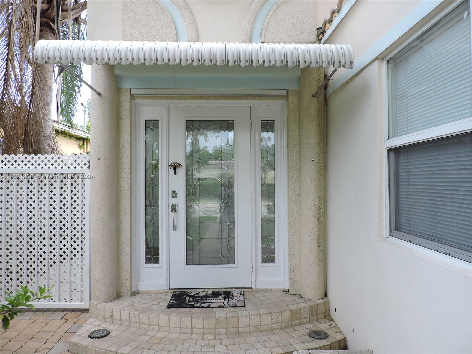 1630 Tyler Street Hollywood, FL 33020 - Photo 3 of 26 a front view of a house